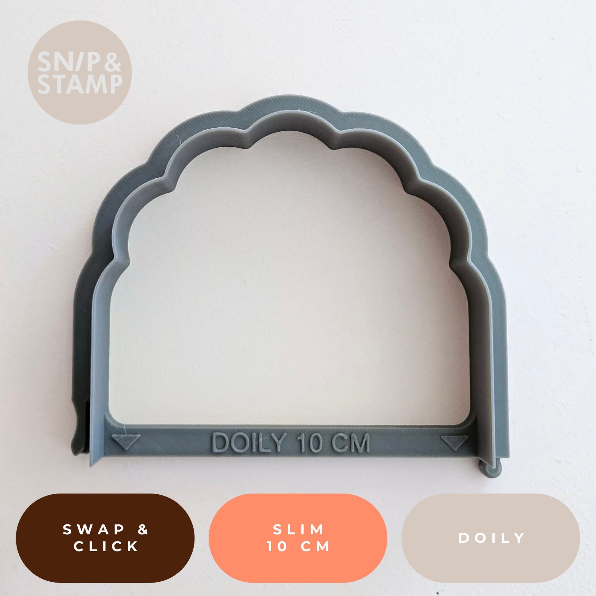 Gray doily cutter with measurements on a white background